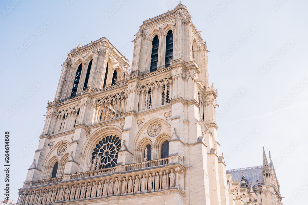 facade of notre dame de Paris, medieval cathedral (church) in paris, france.