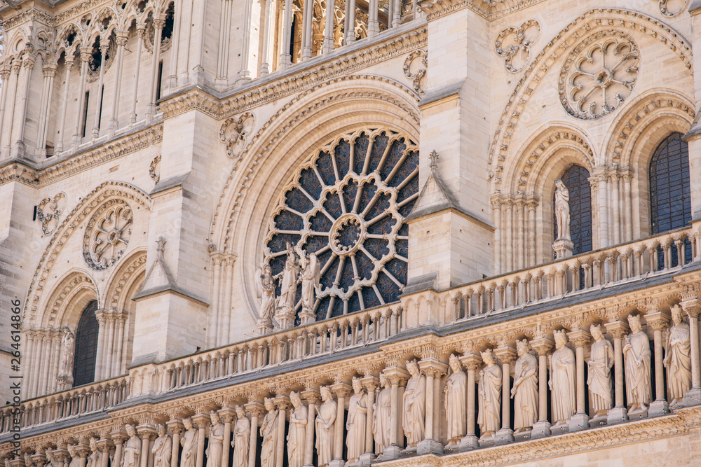 Obraz premium Architectural fragments of Reims Notre-Dame cathedral. Notre-Dame de Reims Cathedral Our Lady of Reims, 1275 is Roman Catholic Church in Reims. France.
