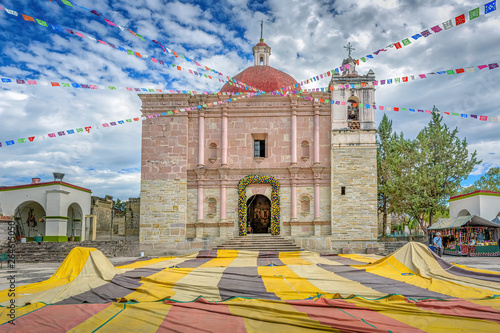 A beautiful colorful old church in Mitla, Oaxaca, Mexico photo