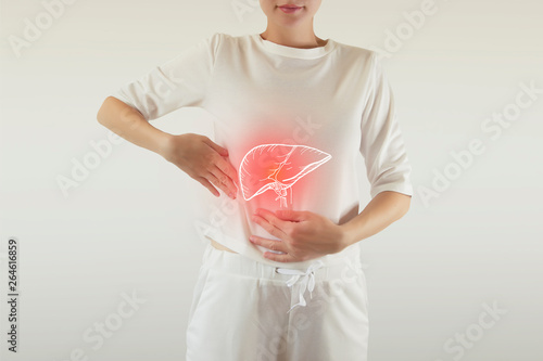 Digital composite of highlighted red painful liver of woman photo