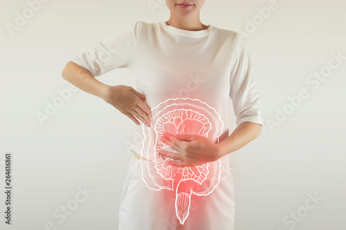 Bild auf Leinwand Digital composite of highlighted redinjured or infected intestine of woman