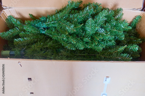Canvas Print Disassembled artificial Christmas coniferous tree
