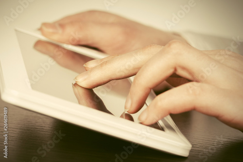 Business woman using tablet computer © Wrangler