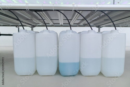 Liquid Fertilizer in plastic bottle hydroponic system photo