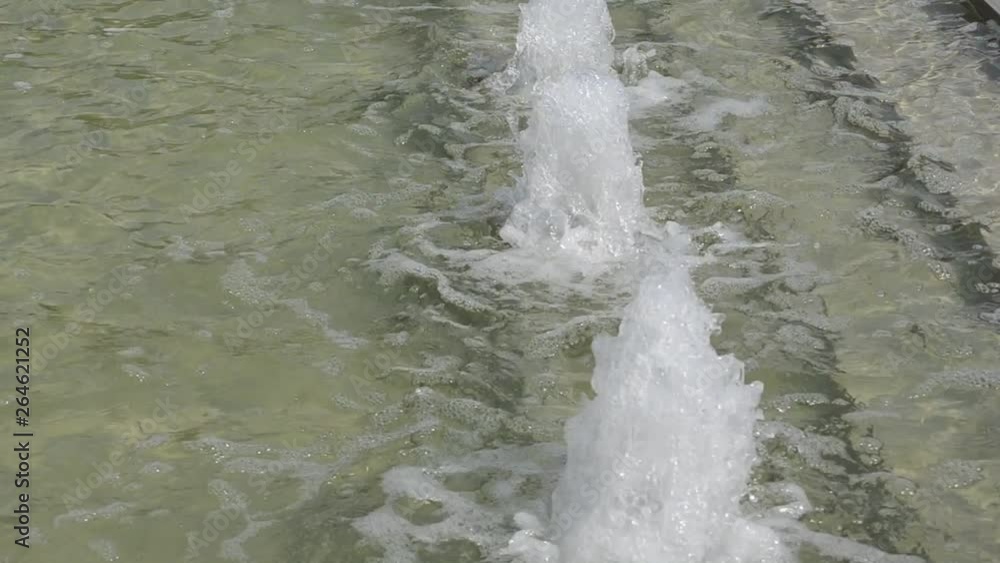 City fountain close up, cool in summer hot day, flowing water City fountain close up, cool in summer hot day, flowing water