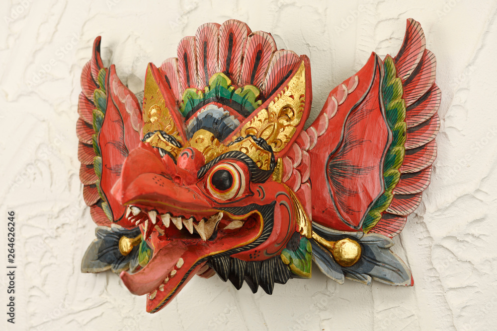 Snavset Frø Overstige Red Balinese demon Barong Dance Mask from Garuda Indonesia on a stucco wall  Stock Photo | Adobe Stock