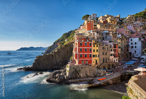 Colorful long exposure picture of Riomaggiore on the Cinque Terre coast of Italy