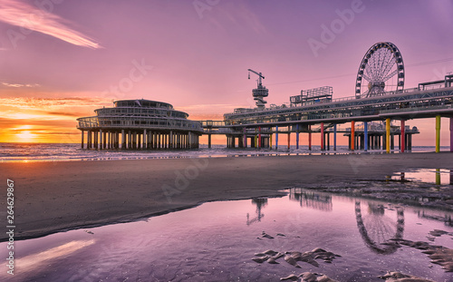 Beach pier Scheveningen at sunset