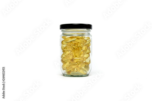 Gold fish oil isolated for good health on white background view. Supplementary food. Omega 3. Vitamin E. Capsules salmon fish oil.