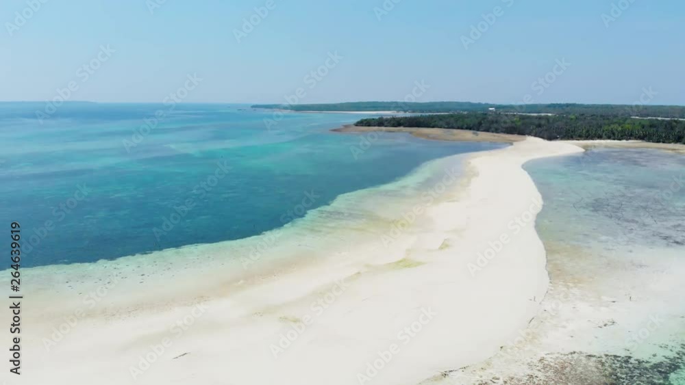 Aerial: tropical beach island reef caribbean sea white sand beach Snake Island, Indonesia Moluccas archipelago, Kei Islands, Banda Sea, travel destination Aerial: tropical beach island reef caribbean sea white sand beach Snake Island, Indonesia Moluccas archipelago, Kei Islands, Banda Sea, travel destination