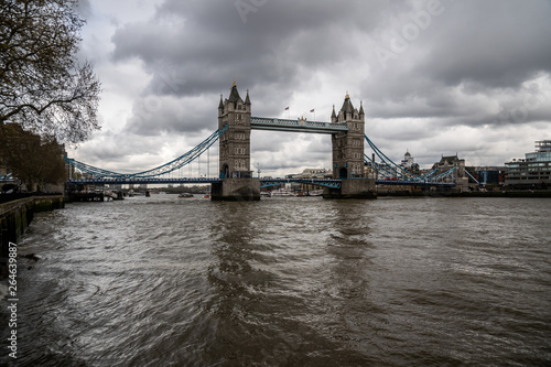 Tower Bridge in London, UK. Cloudy day and rain with beautiful dramatic clouds.