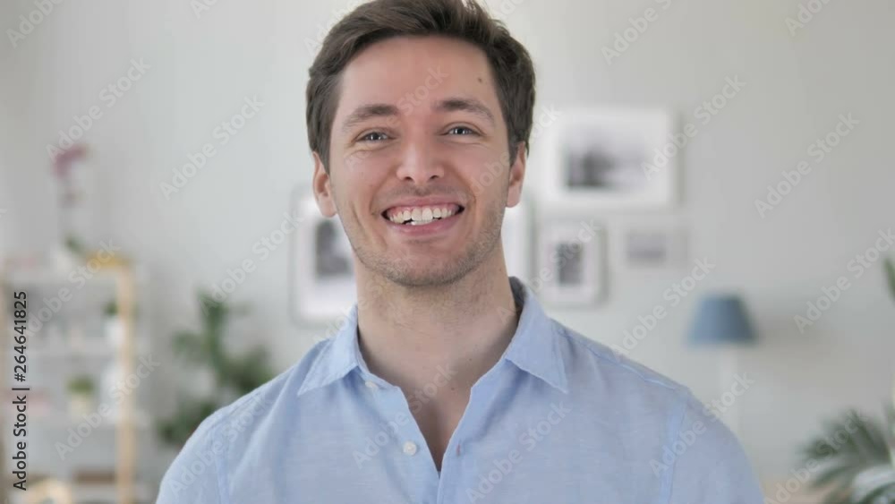 Inviting Gesture by Beard Handsome Young Man Inviting Gesture by Beard Handsome Young Man