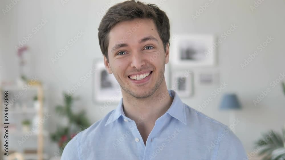 Amazed Handsome Young Man Surprised by Positive Events Amazed Handsome Young Man Surprised by Positive Events
