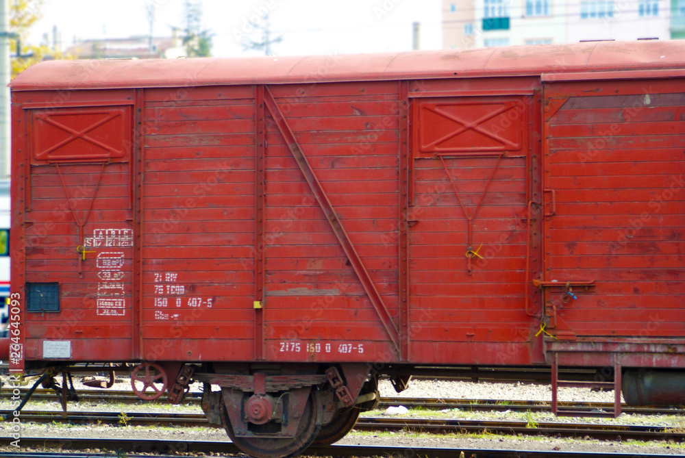 Red old train wagon. Old train carriage on railway. Red old train wagon. Old train carriage on railway.