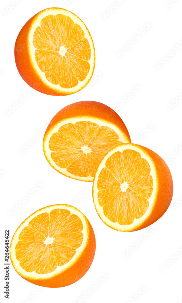 Isolated falling orange fruits pieces. Halves of orange in the air isolated on white background with clipping path Isolated falling orange fruits pieces. Halves of orange in the air isolated on white background with clipping path