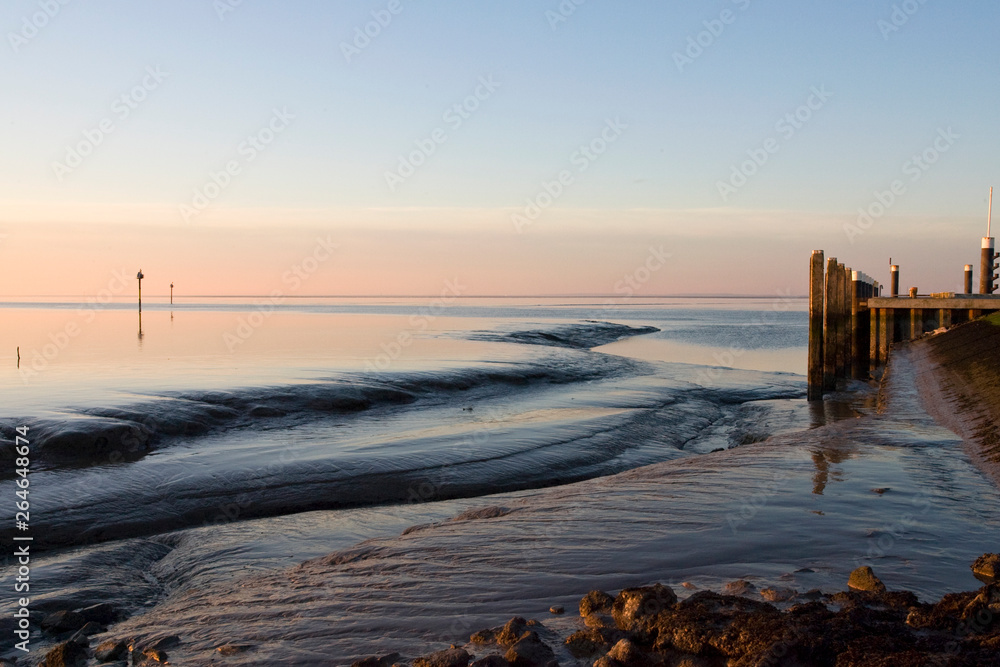 Sunset over the Wadden Sea near Holwerd, Netherlands