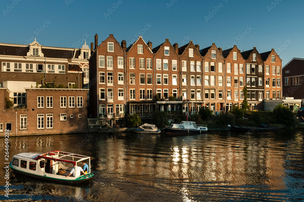 Cityscape of a canal in Amsterdam, capital of the Netherlands
