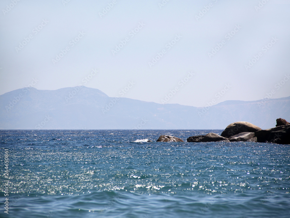 Seascape. Coast , coastline. The rocks in the distance. Tourism concept. Vacation , vacation on the sea or ocean.