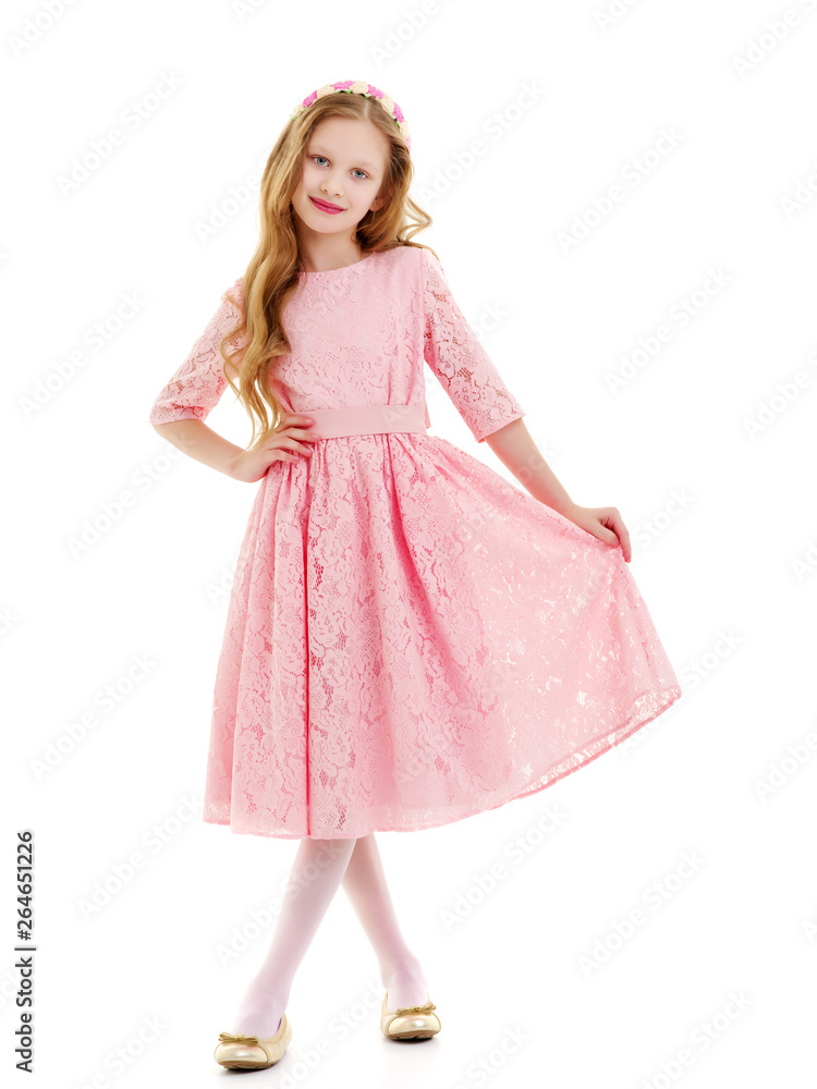 Little girl in an elegant dress.