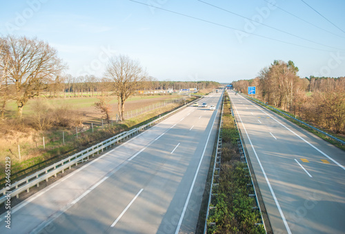 The cars going on the autobahn, a view from the bridge over the road