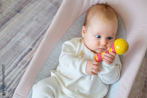 Φωτογραφία Adorable baby girl having fun in bouncer