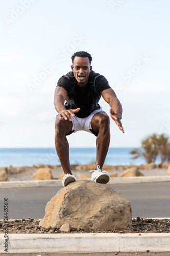 Black african american young man sdoing outdoor workout photo