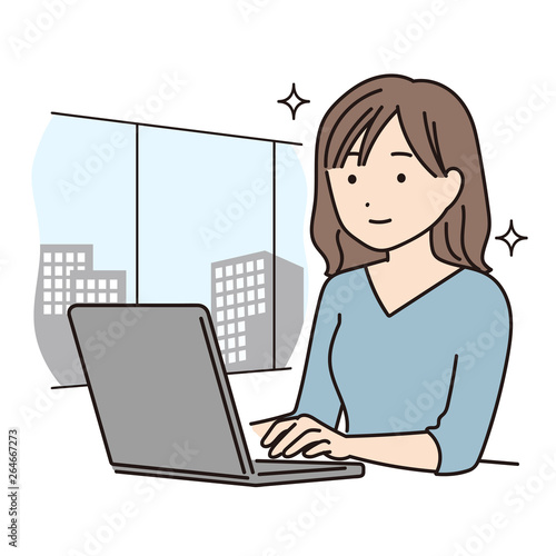 オフィスでPCを使って仕事をする女性