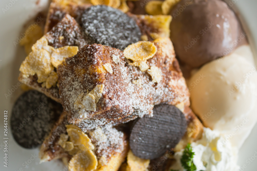 Toast Bread or Dessert and Oreo Cookies Ice Cream Cornflakes Whipped Cream Chocolate Powder Flatlay Closeup Toast Bread or Dessert and Oreo Cookies Ice Cream Cornflakes Whipped Cream Chocolate Powder Flatlay Closeup