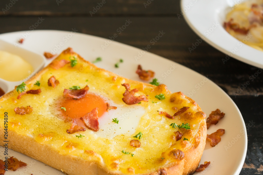 Egg Yolk Bacon Ham Cheese Bread Toast and Coriander for Breakfast Left