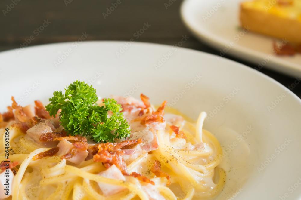 Spaghetti Carbonara with Bacon and Ham and Parsley and Mayonnaise Sauce Left 2 Spaghetti Carbonara with Bacon and Ham and Parsley and Mayonnaise Sauce Left 2