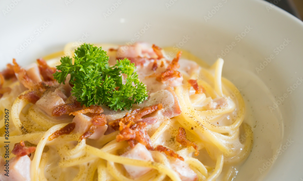 Spaghetti Carbonara with Bacon and Ham and Parsley and Mayonnaise Sauce Left Spaghetti Carbonara with Bacon and Ham and Parsley and Mayonnaise Sauce Left