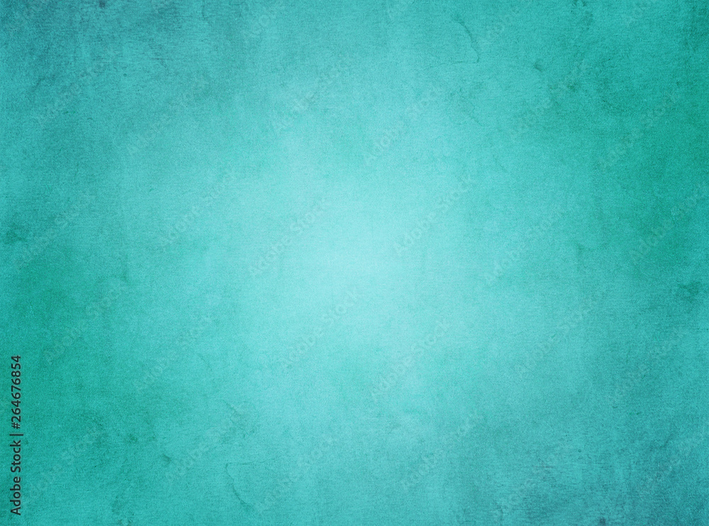 An elegant, rich turquoise, grunge parchment texture background with glowing center. 