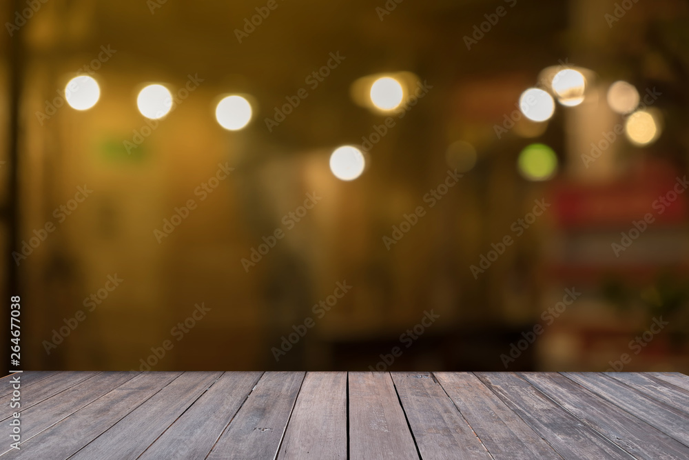 Wooden table in front abstract blurred background, used for presentation and background your product