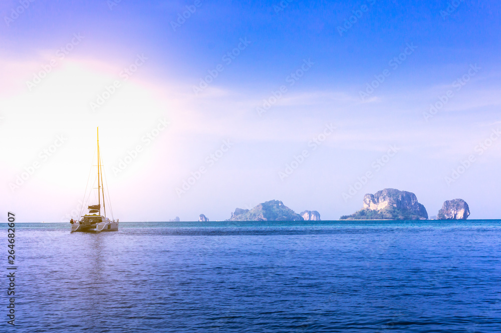 Morning sunrise at the pier Railay Bay, railay Beach railay Amphur Muang, Krabi Thailand is located in the zone of the National Park