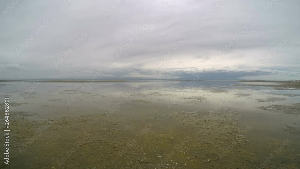4K. Movement of the clouds over the salted lake Durgun Nuur, Mongolia. Ultra HD, 3840x2160 4K. Movement of the clouds over the salted lake Durgun Nuur, Mongolia. Ultra HD, 3840x2160