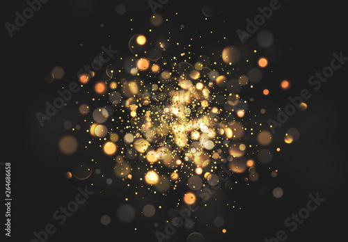 Christmas golden lights. Background of bright glow bokeh photo
