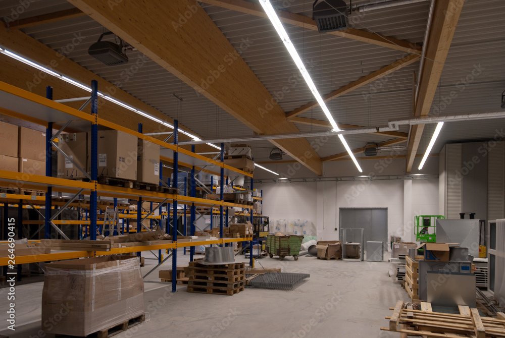 a large factory building is converted into a warehouse a large factory building is converted into a warehouse