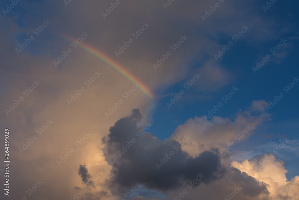 rainbow in the sky clouds