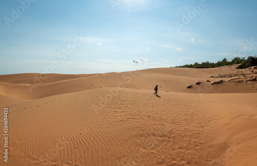 people walk in the sand desert