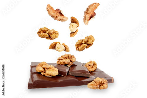 dark chocolate bar with walnuts on a white background