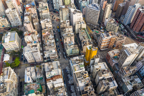 Drone fly over Hong Kong residential city © leungchopan