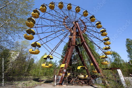Abandoned amusement park in the city center of Prypiat in Chornobyl exclusion zone. Radioactive zone in Pripyat city - abandoned ghost town. Chernobyl history of catastrophe. April 2019