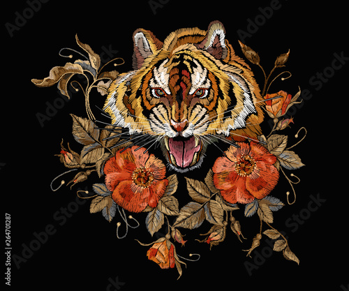 Embroidery tiger head and beautiful roses flowers. Fashionable template for design of clothes, t-shirt design, tapestry flowers renaissance style