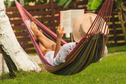 Beautiful woman relaxing in hammock.