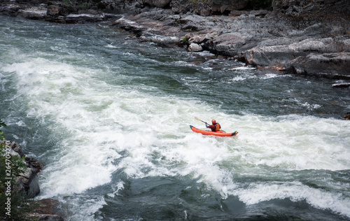 Man kayaking down the Rogue River
