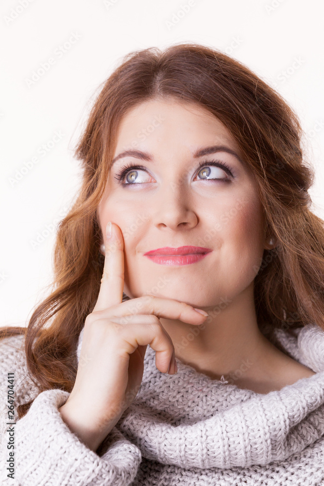 Confused young woman in sweater Confused young woman in sweater