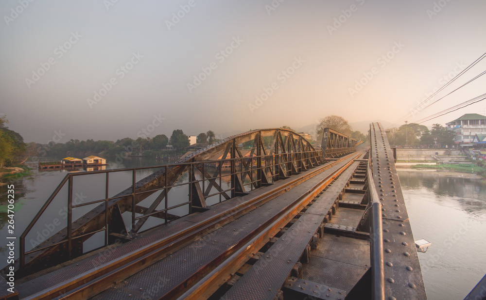 Obraz premium Historical bridge over the river Kwai on sky background