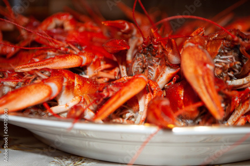 Bokeh with boiled crayfish on the table