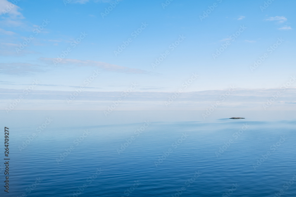 Beautiful sea landscape with island and nice evening light at summer day in archipelago Gulf of Finland Beautiful sea landscape with island and nice evening light at summer day in archipelago Gulf of Finland