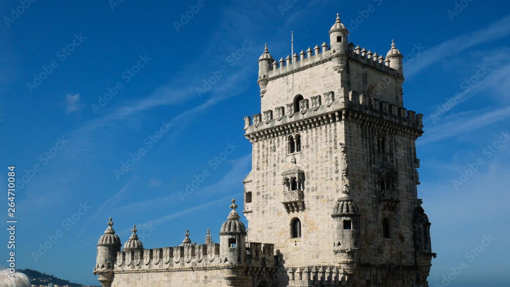 view of the tower of Belem, Tagus river, clear day and blue sky, Lisbon